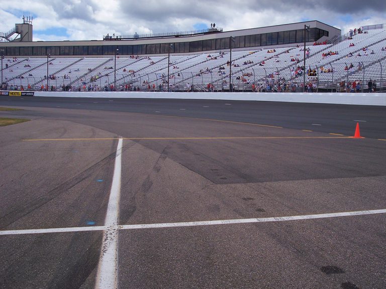Pit Road Exit on Turn 1 - Notice the flat banking of the turns