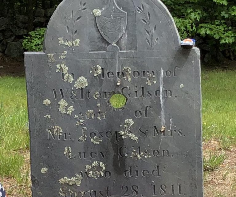 Close up of the hole int the grave marker